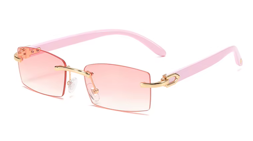 Rimless rectangle sunglasses with pink-tinted lenses, gold metal bridge, and pink acetate temples