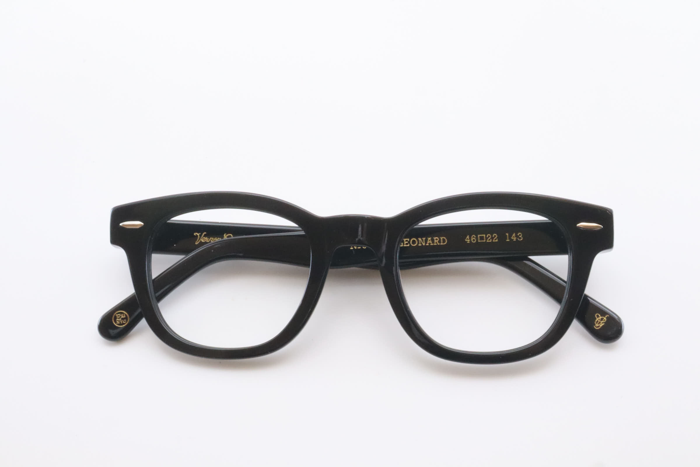 Black acetate square optical frames with polished finish and rounded edges, front view