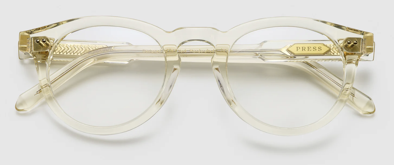 Clear champagne cat-eye optical frames with gold metal accents, combo material construction