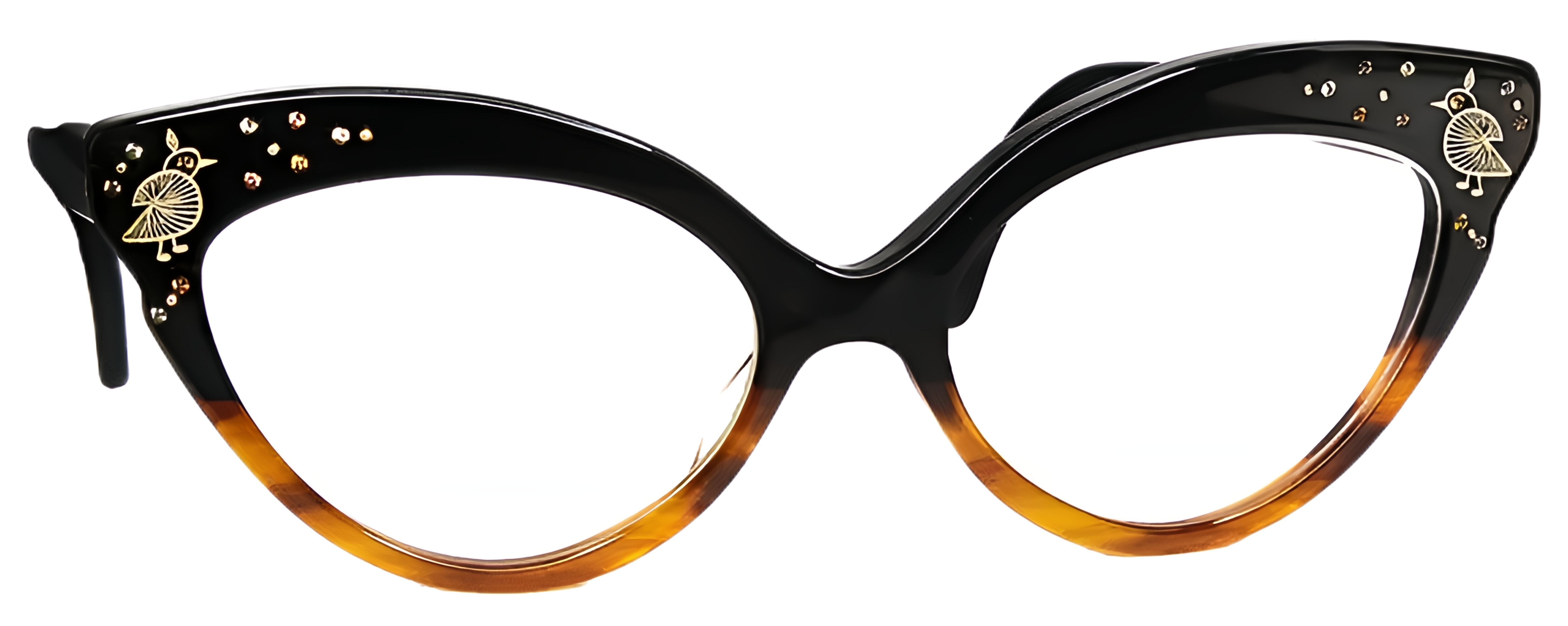 Sculptural black and amber cat-eye frame in acetate with gold bird motifs and scattered warm-toned crystals.