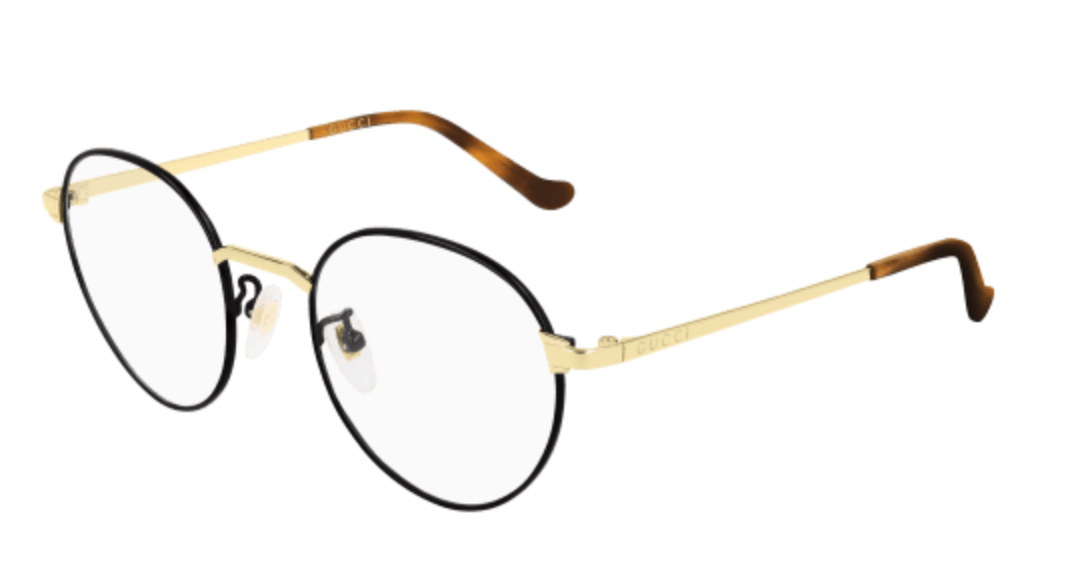 Gucci GG0581O round eyeglasses in Black Gold Transparent